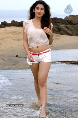Parul Gulati in tiny shorts at beach Latest hot shoot stills. Gorgeous young actress Parul Gulati, who appeared in Tv programs (Kitani Mohabbat Hai - 2, Yeh Pyaar Na Hoga Kam) and in Bollywood movies. Recently she has done a Punjabi movie called Bura
